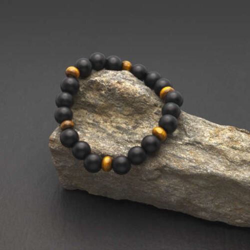 Pulsera artesanal de lava pulida y madera